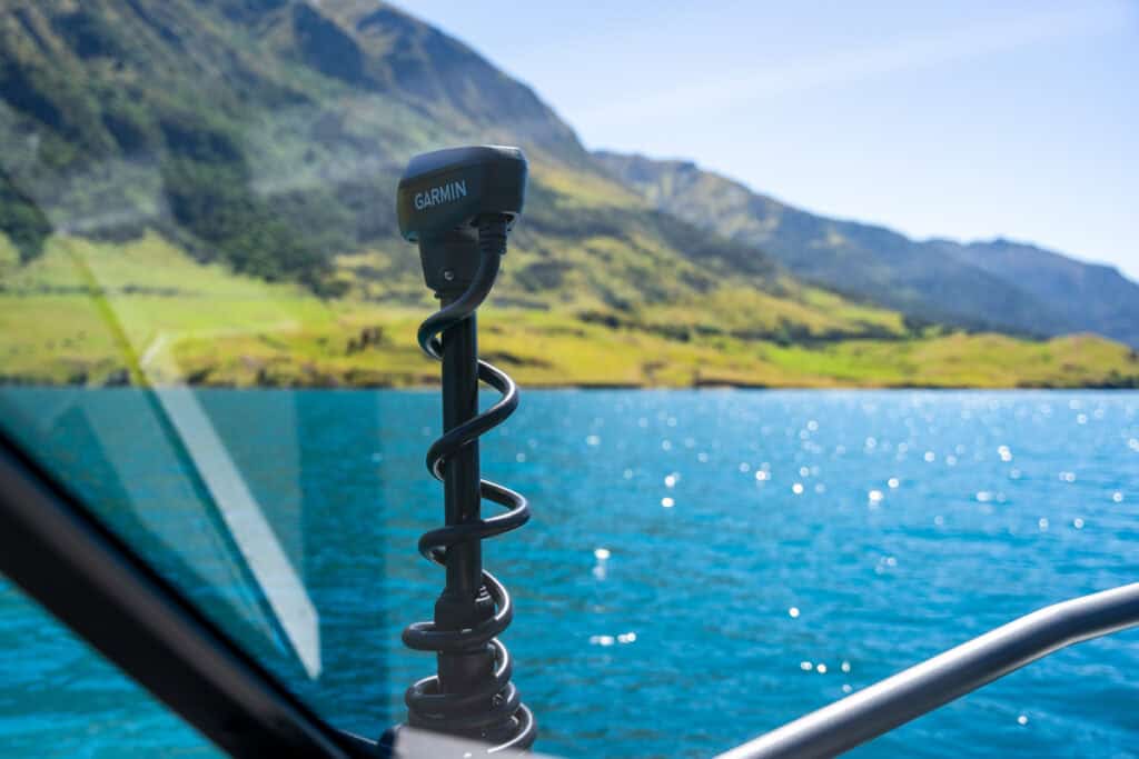Close-up of an electric trolling motor used on a sustainable fishing charter in New Zealand